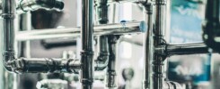 a group of pipes in a factory